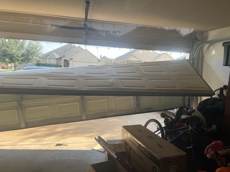 Project Fixing a Garage Door Off-Track in Bryan TX image